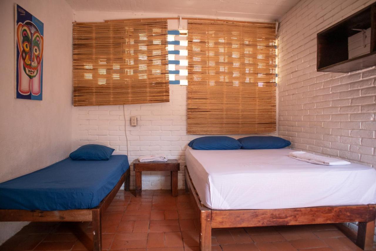 Hostal Shalom ปูแอร์โตเอสกอนดิโด ภายนอก รูปภาพ